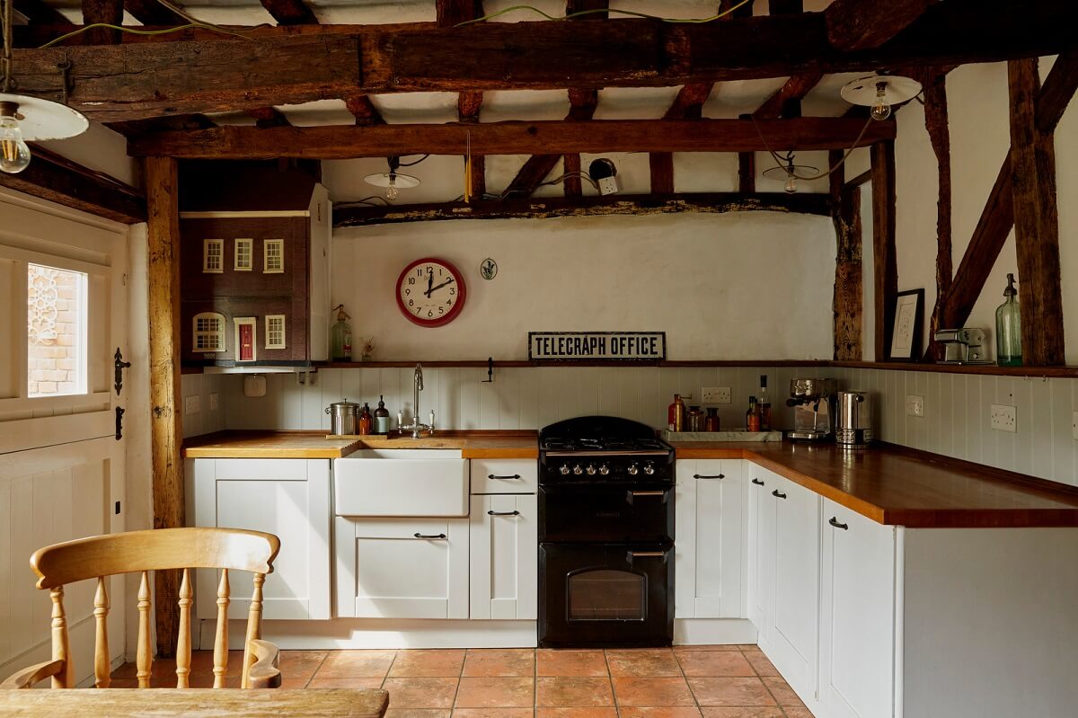 A Cozy Home with Exposed Beams in a Former Post Office 3 cottage-style-kitchen-exposed-beams-nordroom