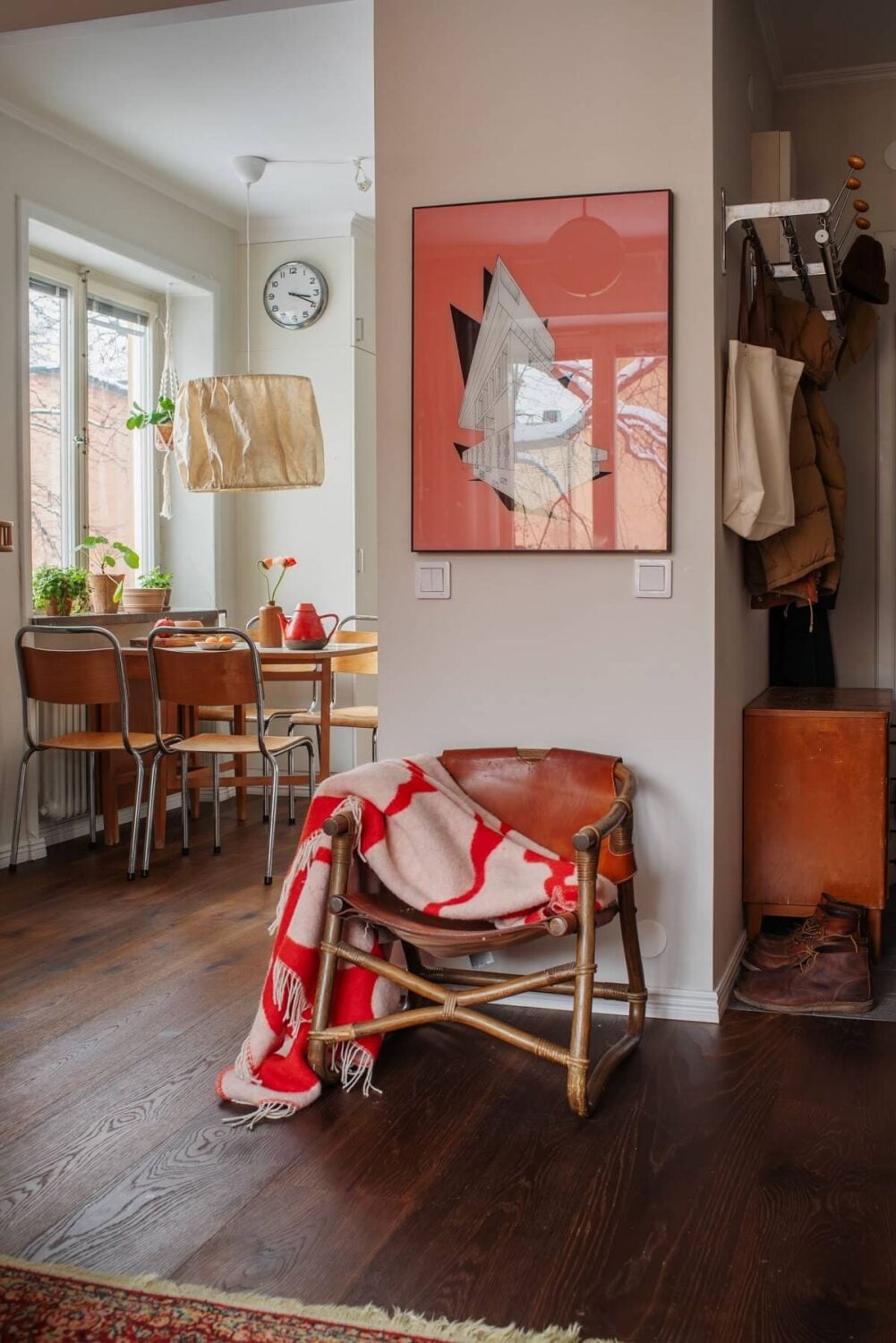 A Small Swedish Apartment with Warm Color Accents 8 dark wooden floor small apartment