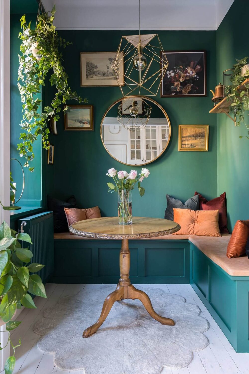 Color of the Year 2025 Prediction (with Color Palettes) 18 deep-green-breakfast-nook-bench-color-trends-2025-nordroom