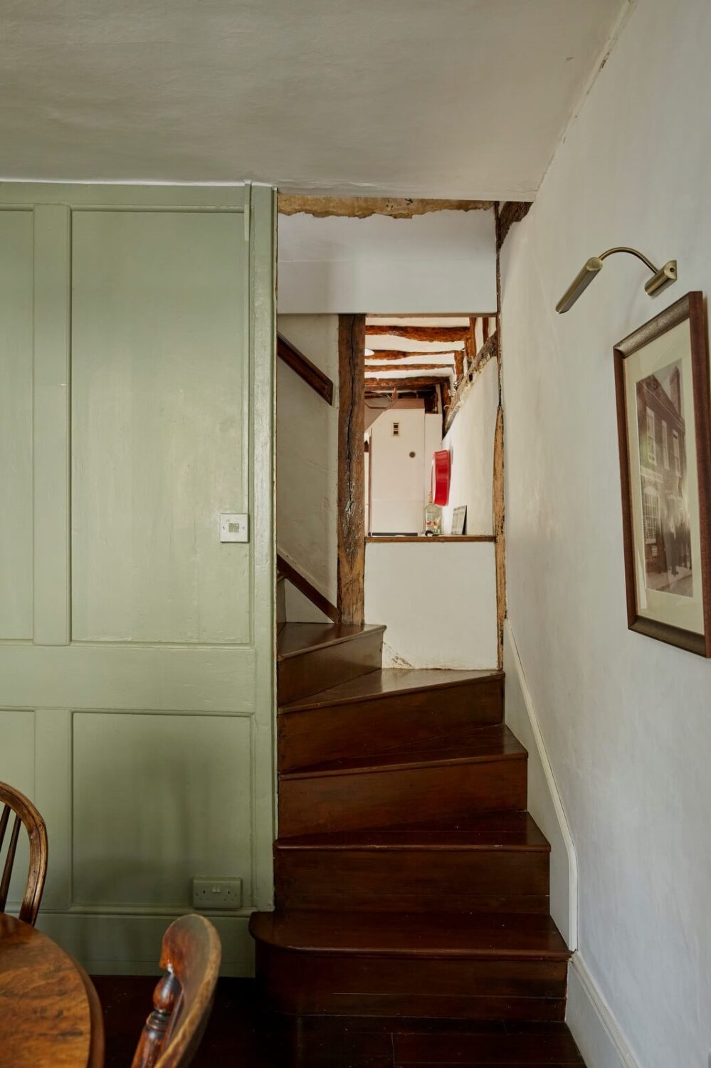 A Cozy Home with Exposed Beams in a Former Post Office 6 dining-room-muted-green-walls