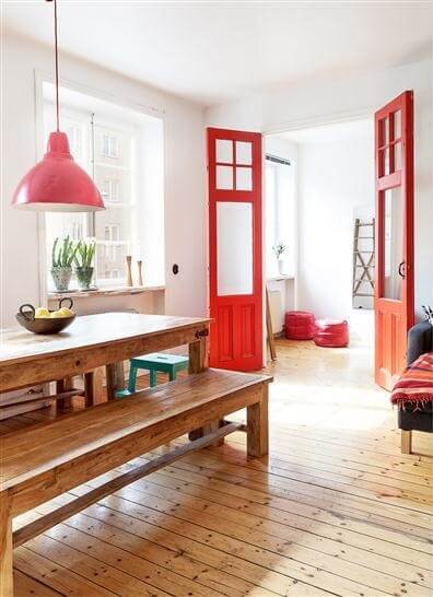 50+ Rooms That Prove ‘The Unexpected Red Theory’ Really Works 63 dining room with red painted doors