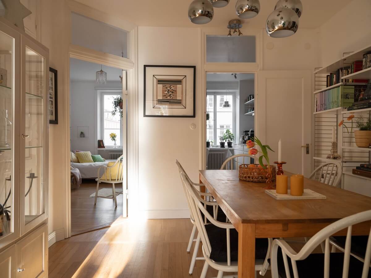 A Swedish Apartment with Light-Filled Rooms 5 dining room with sunlight flooding in