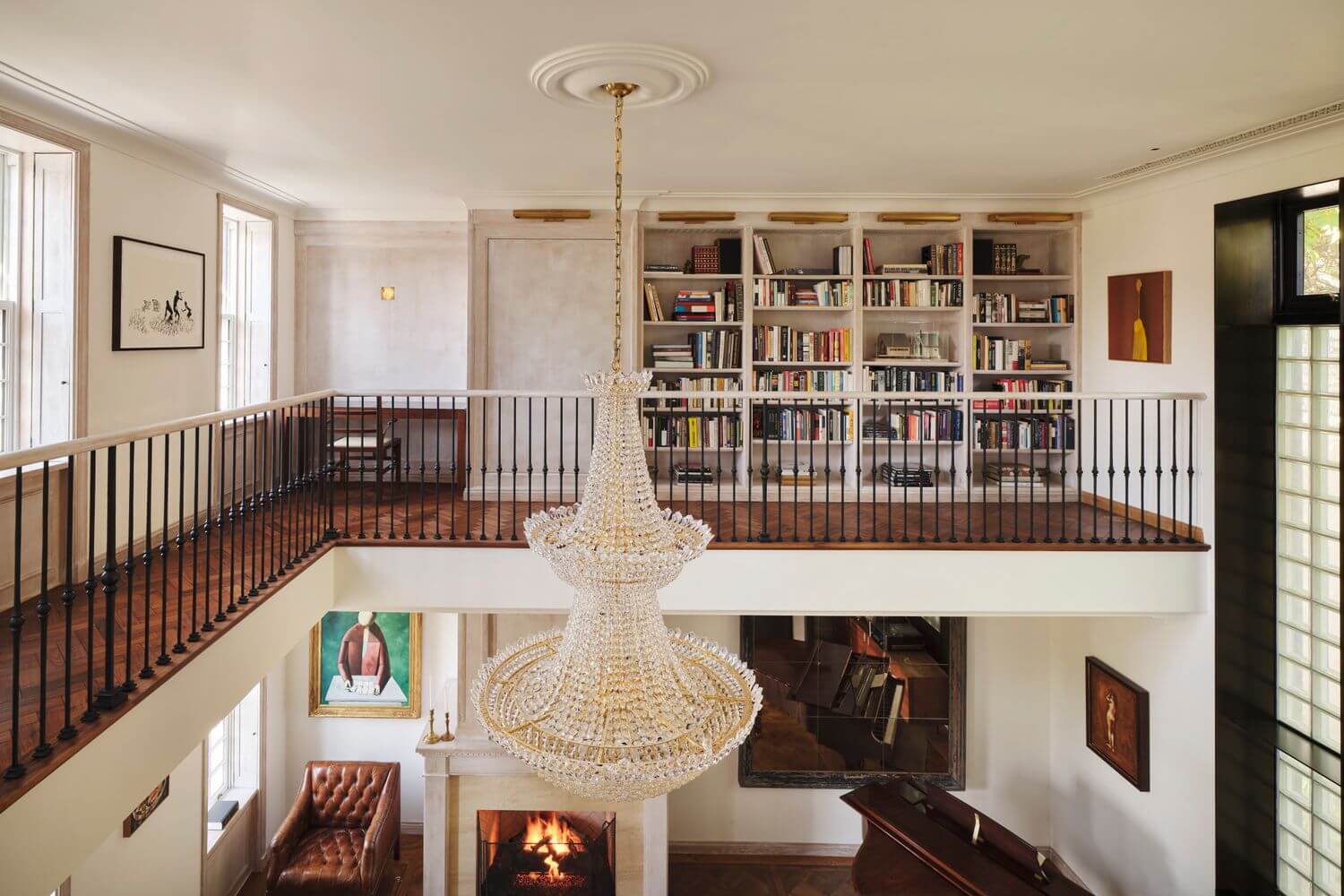 A New York Penthouse with a Rooftop Cottage 7 double height ceiling bookcases new york penthouse