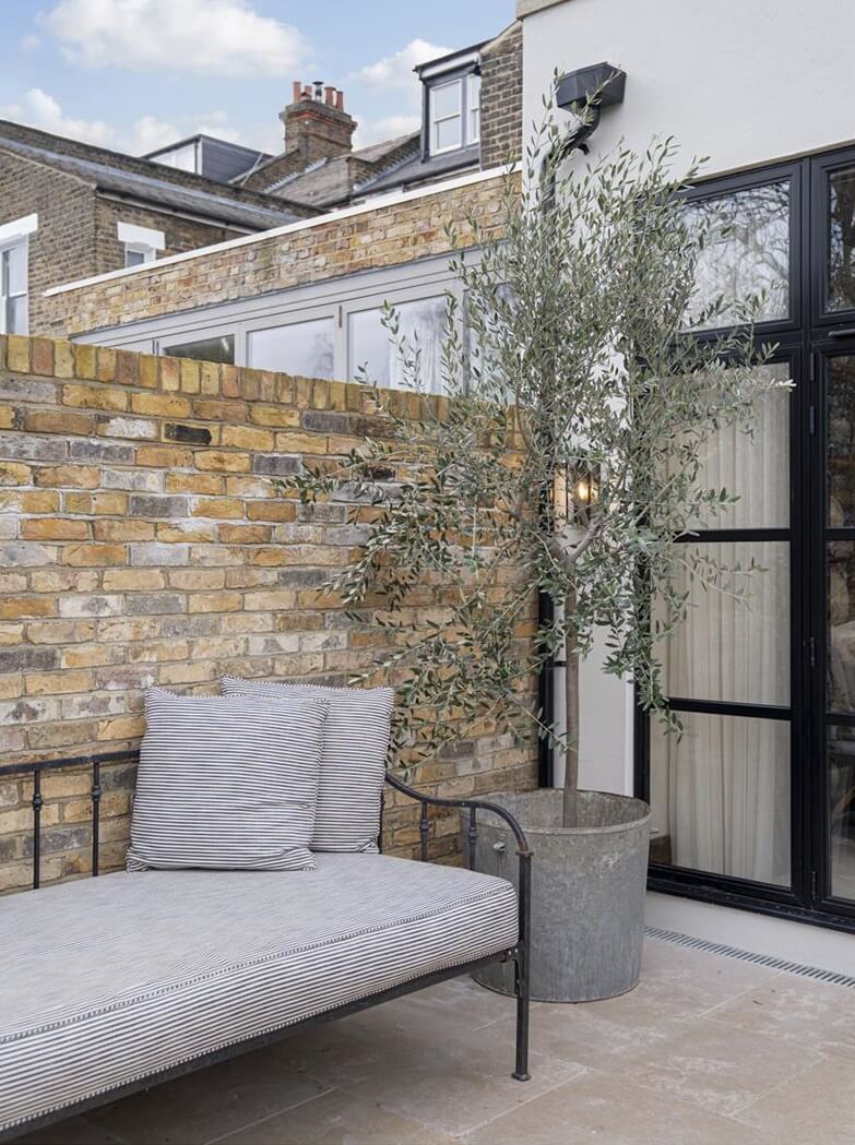 Modern Rustic Interiors in an Edwardian House in London 35 garden seating