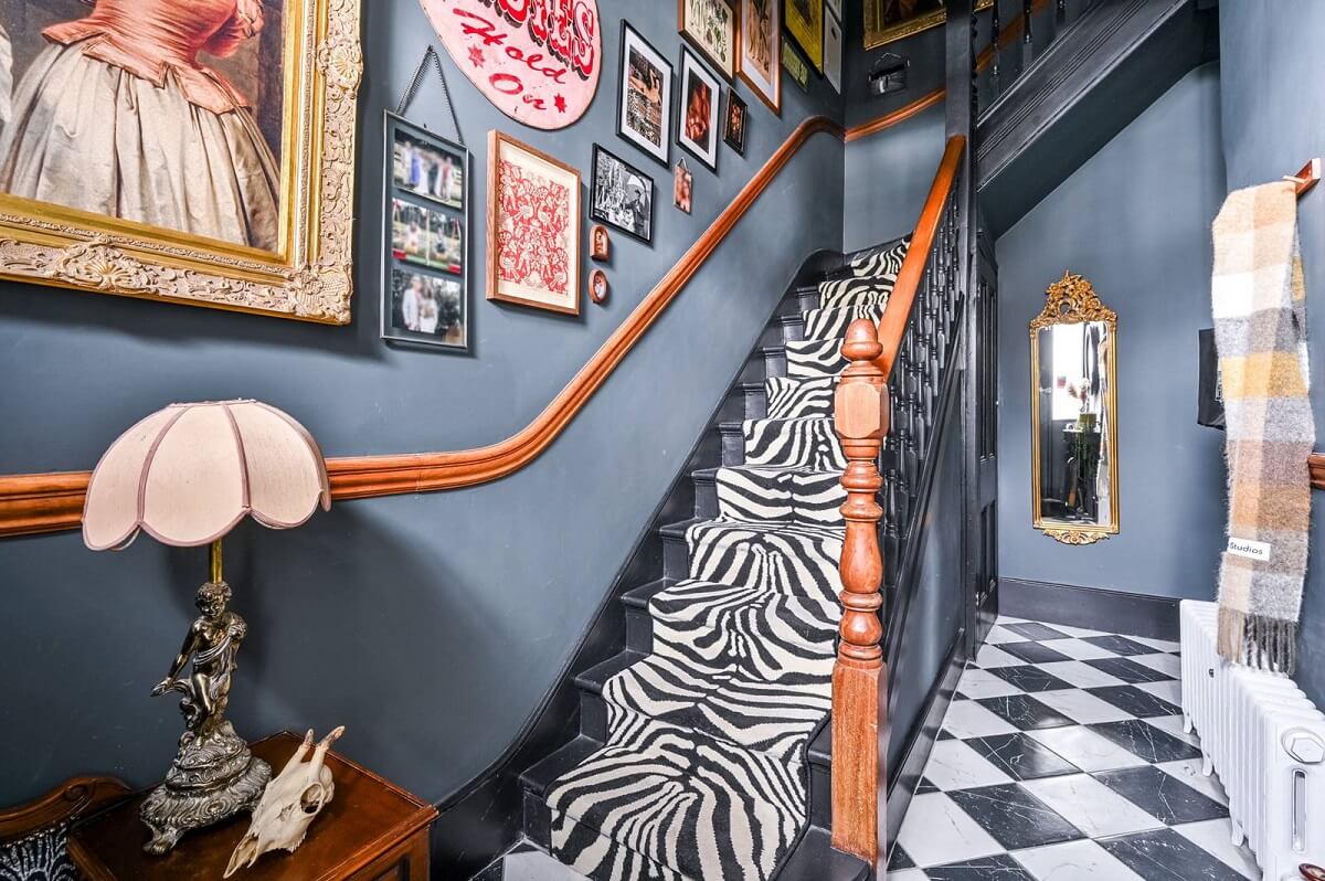 An Eclectic Victorian Townhouse in London 9 gray-hallway-checkerboard-floor-zebra-stair-runner-nordroom