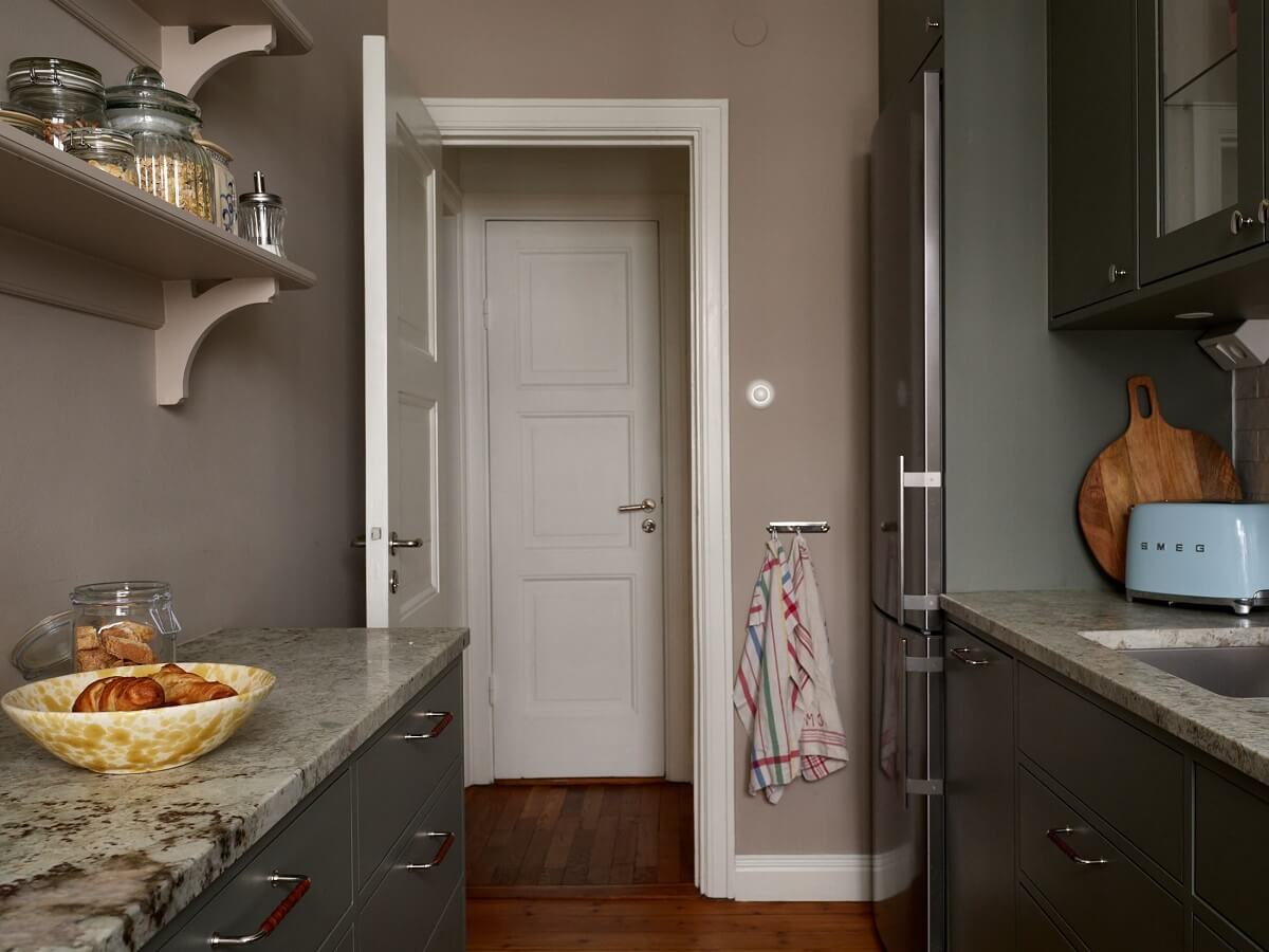 Green Tones in a Renovated Stockholm Duplex Apartment 10 gray kitchen