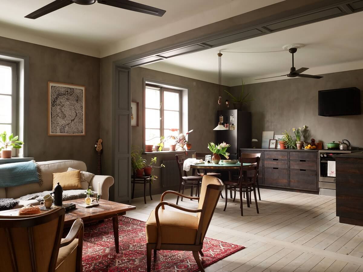Cozy Vintage Style in a Swedish 1920s Apartment 9 gray limewash walls open plan living room kitchen nordroom