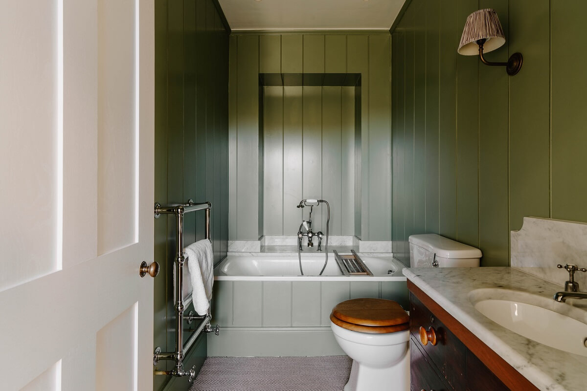 A Restored and Extended London Townhouse 21 green bathroom