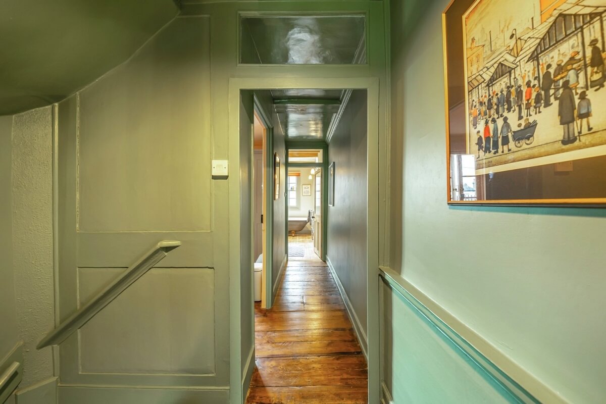 A Colorful Historic Family Home in London 20 green hallway