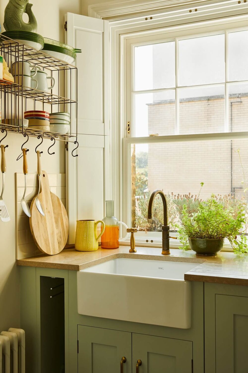 Color of the Year 2025 Prediction (with Color Palettes) 16 green-kitchen-cabinets-butler-sink-color-of-the-year-2025-prediction-nordroom