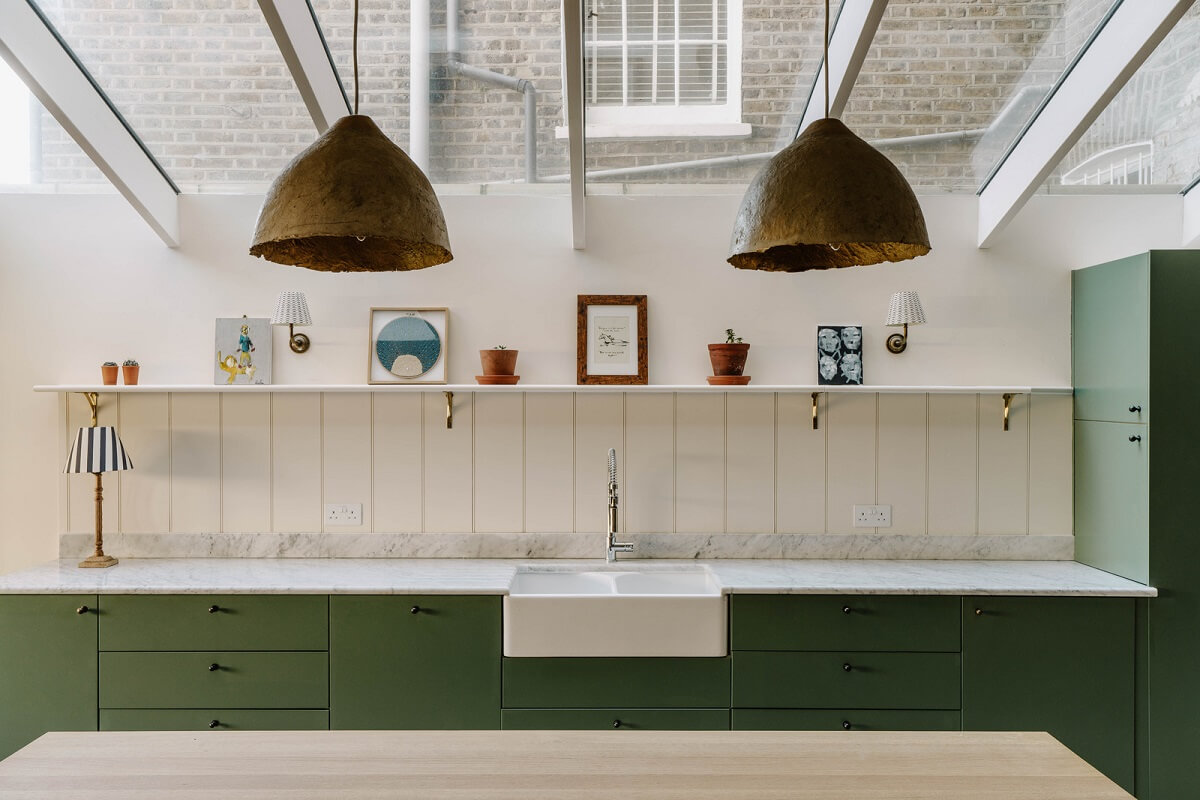 A Restored and Extended London Townhouse 9 green kitchen with shelf and sky window