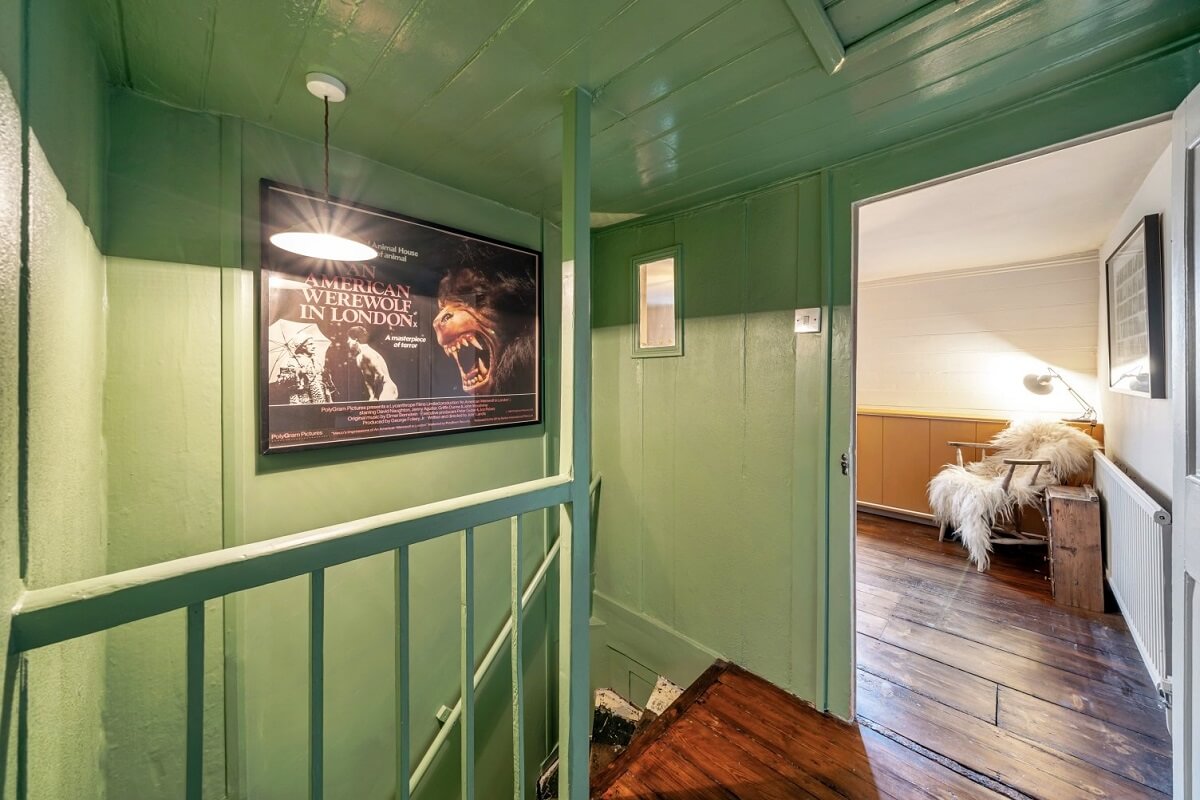 A Colorful Historic Family Home in London 19 green landing
