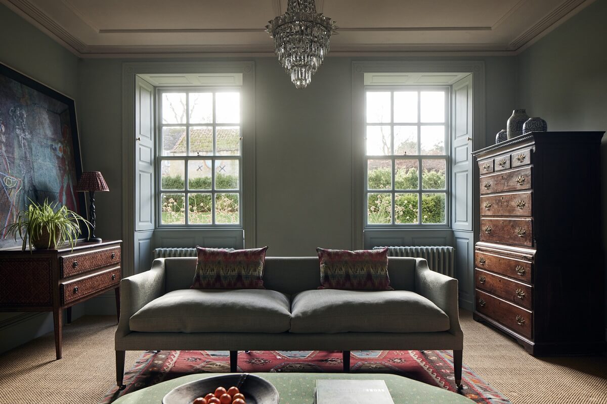 A Historic English Country House with Restored Interiors 12 green living room antique cabinets