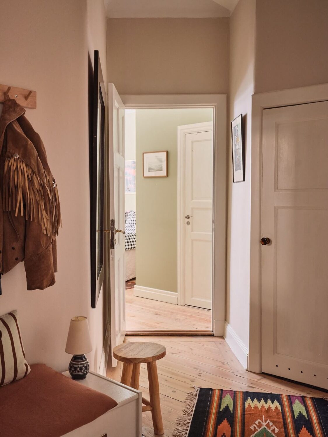 Serene Light Painted Spaces in a Swedish Apartment 19 hallway