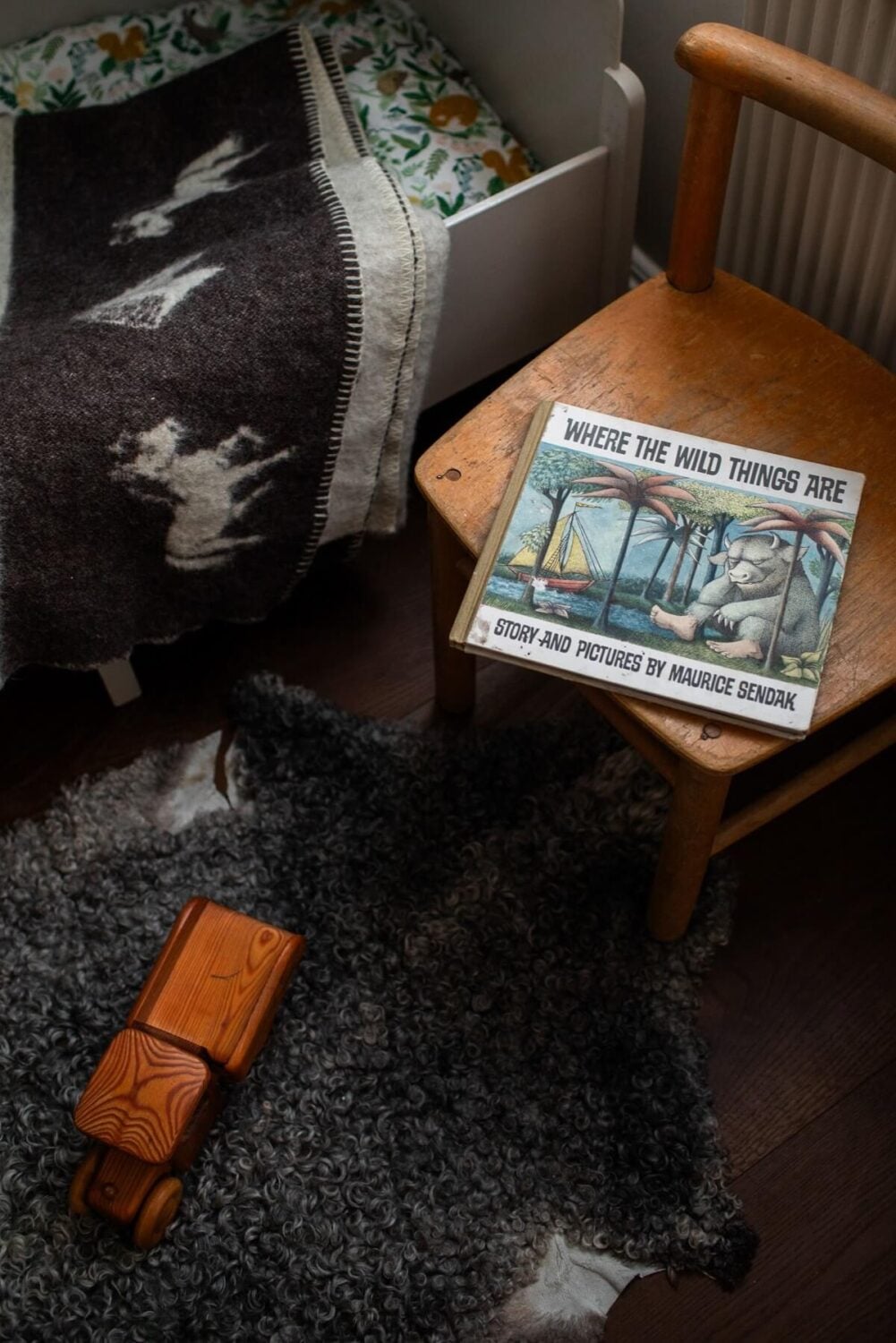 A Small Swedish Apartment with Warm Color Accents 19 kids bedroom detail