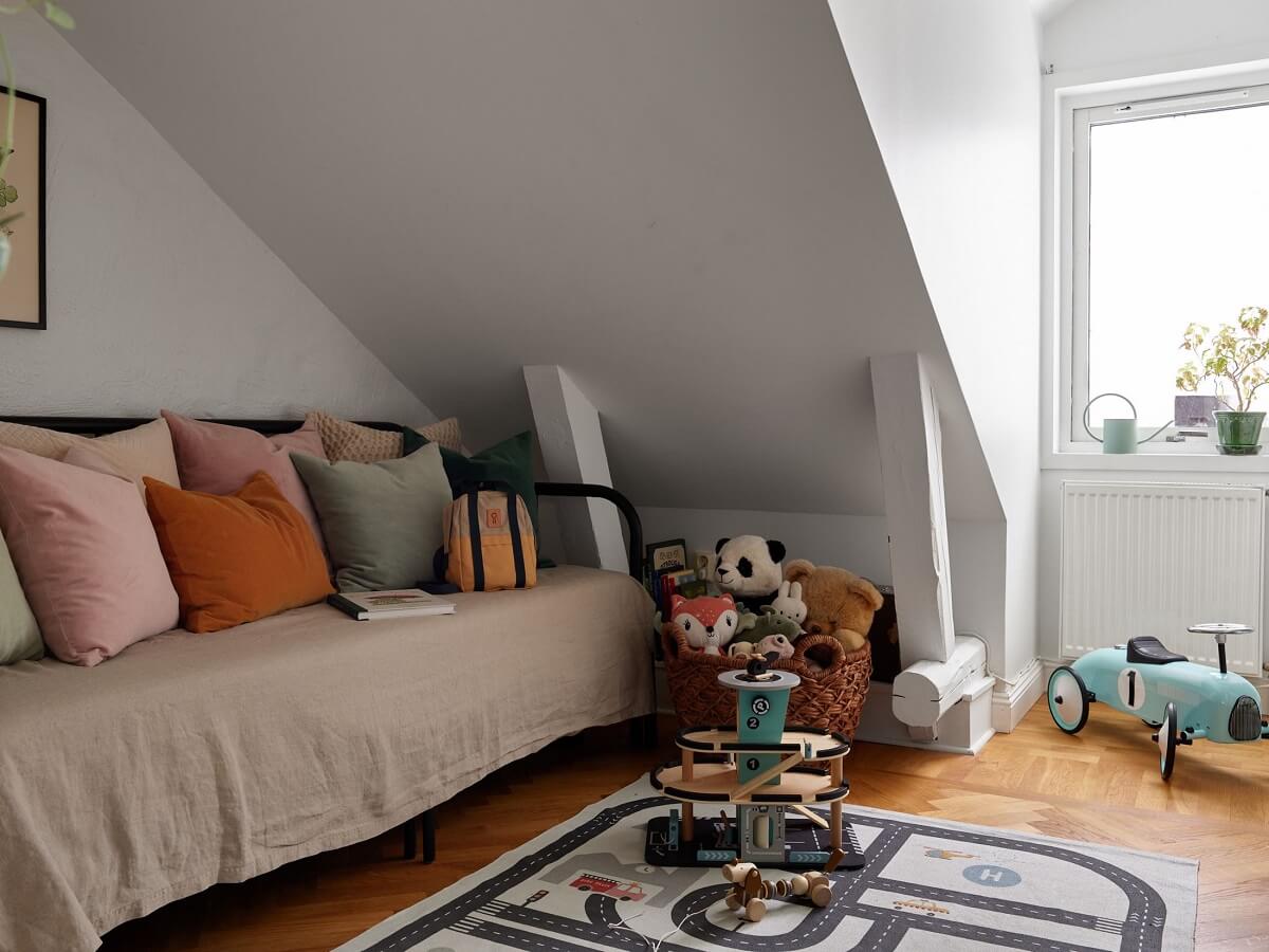 Green Tones in a Renovated Stockholm Duplex Apartment 20 kids bedroom slanted ceiling