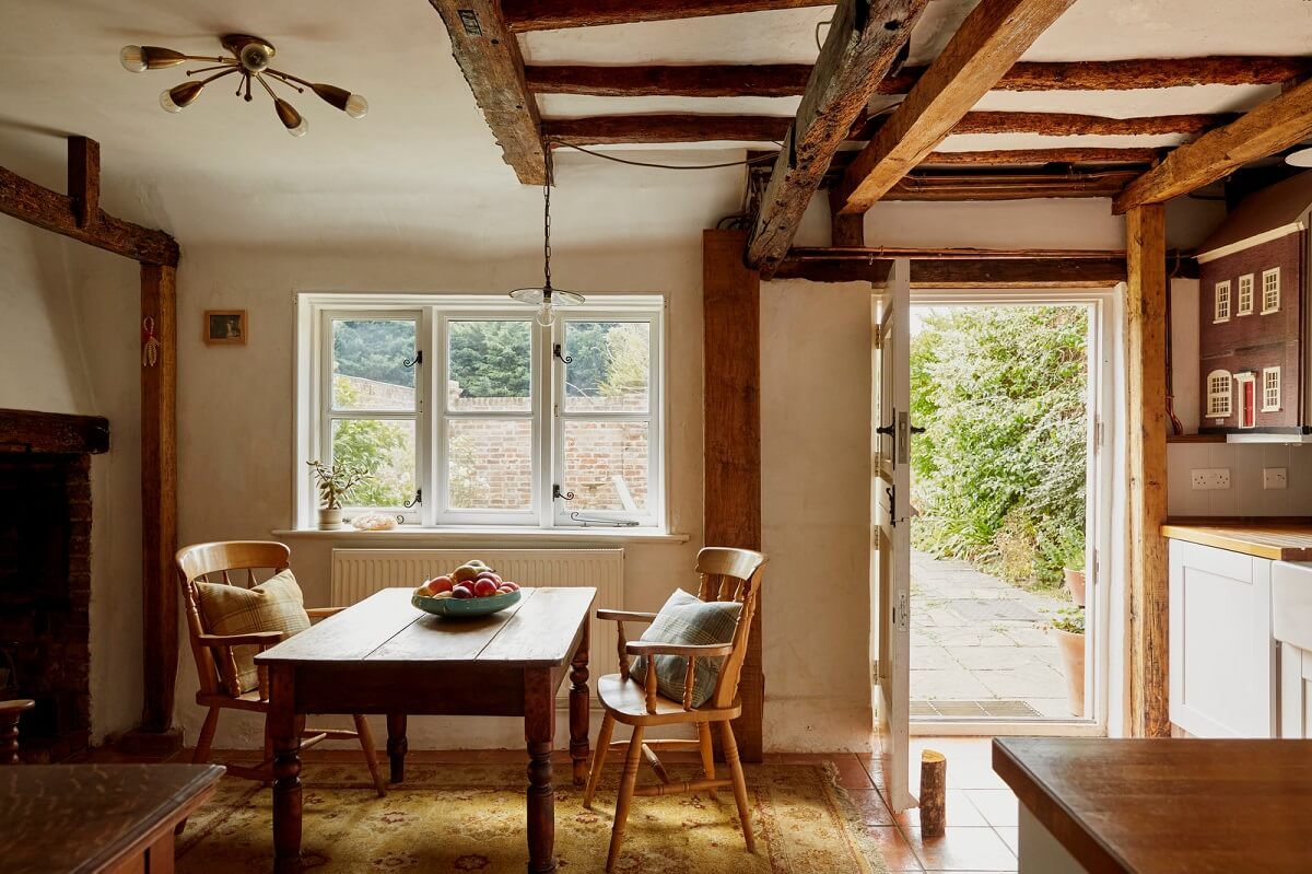 A Cozy Home with Exposed Beams in a Former Post Office 2 kitchen-dining-space-exposed-beams-nordroom
