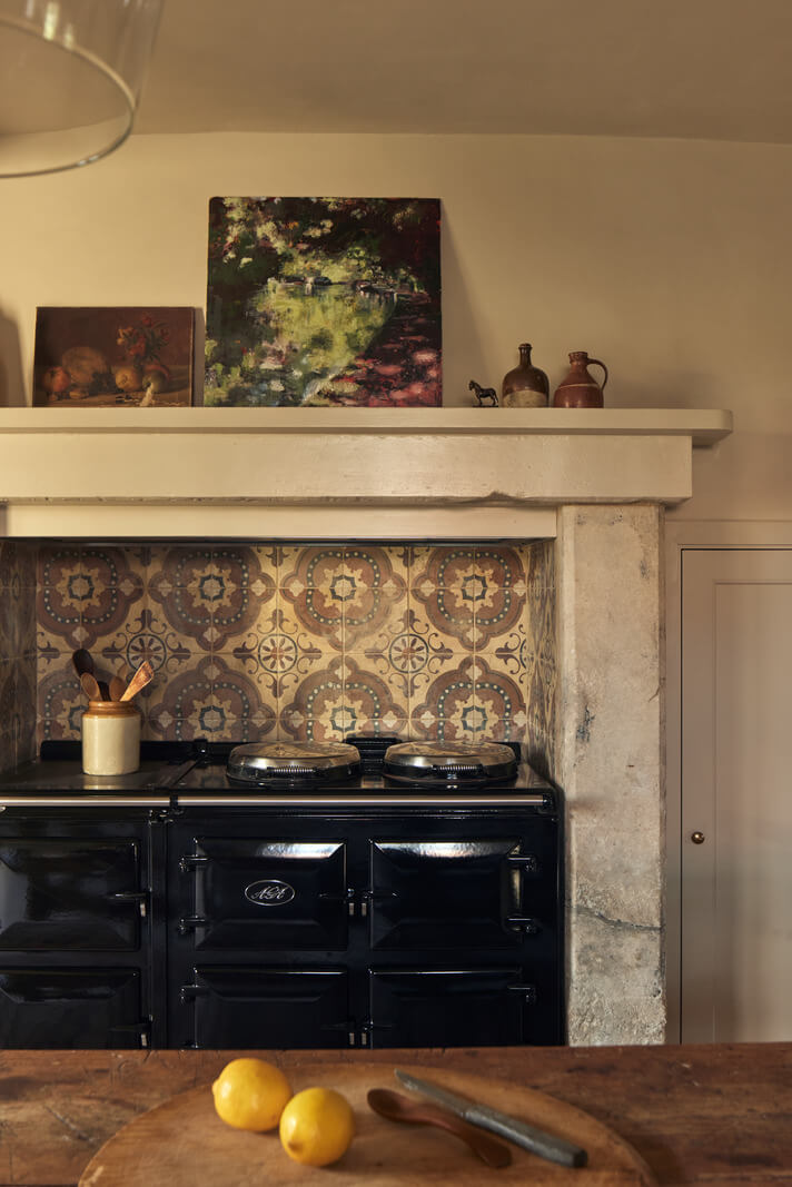 A Historic English Country House with Restored Interiors 3 kitchen fireplace mantel withaga stove