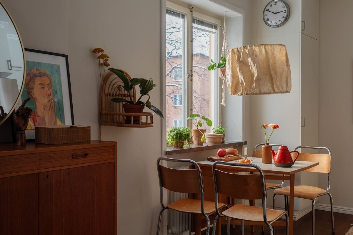 A Small Swedish Apartment with Warm Color Accents 11 kitchen table midcentury style
