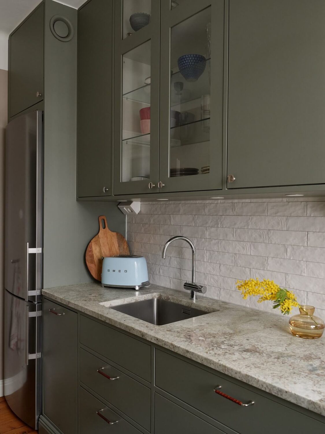 Green Tones in a Renovated Stockholm Duplex Apartment 9 kitchen with marble worktop