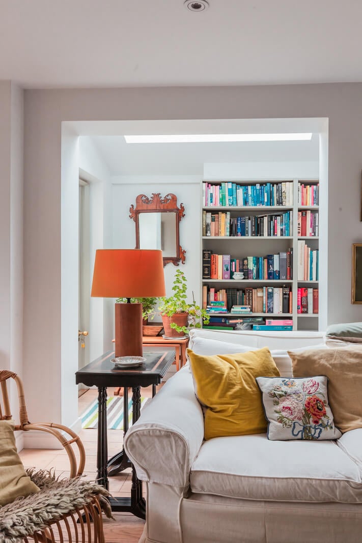A Home with Cottage Interiors in a Former Cambridge Shop 7 light cottage living room bookshelves nordroom