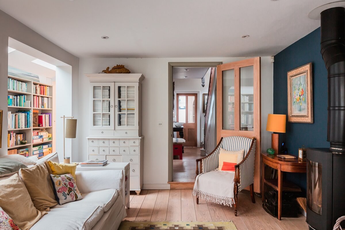 A Home with Cottage Interiors in a Former Cambridge Shop 6 living room blue accent wall