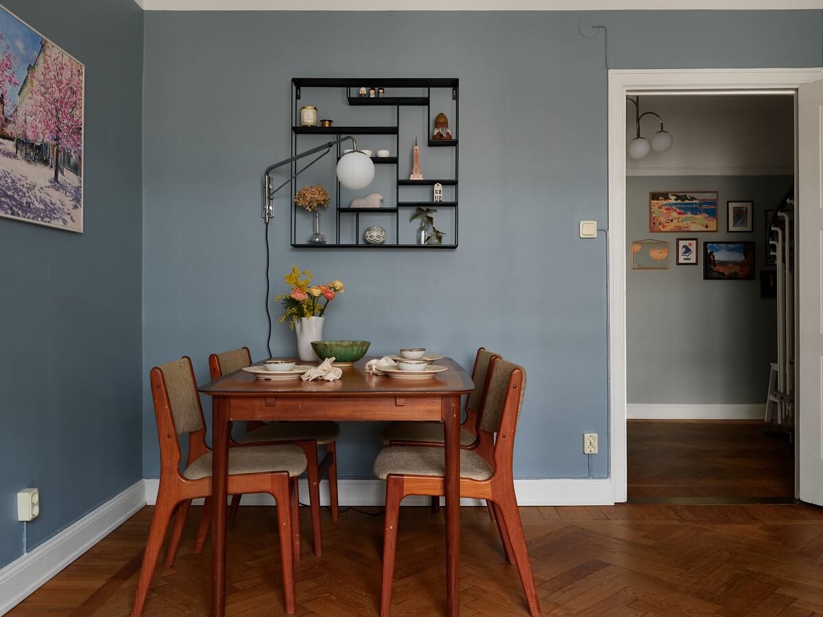Green Tones in a Renovated Stockholm Duplex Apartment 5 living room with dining area