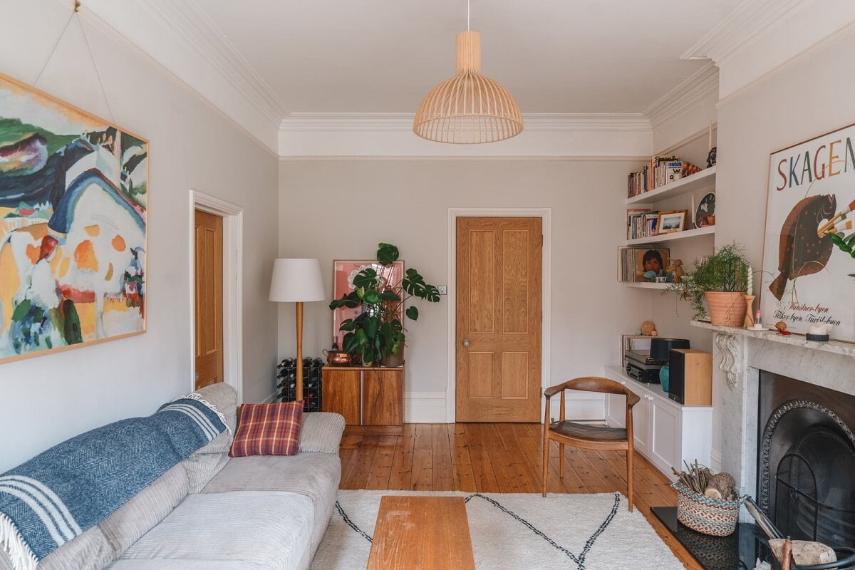 An Award-Winning Apartment with a Modern Extension 2 living room with light gray walls and fireplace nordroom