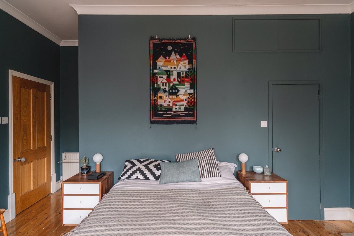An Award-Winning Apartment with a Modern Extension 22 master bedroom with deep blue walls nordroom