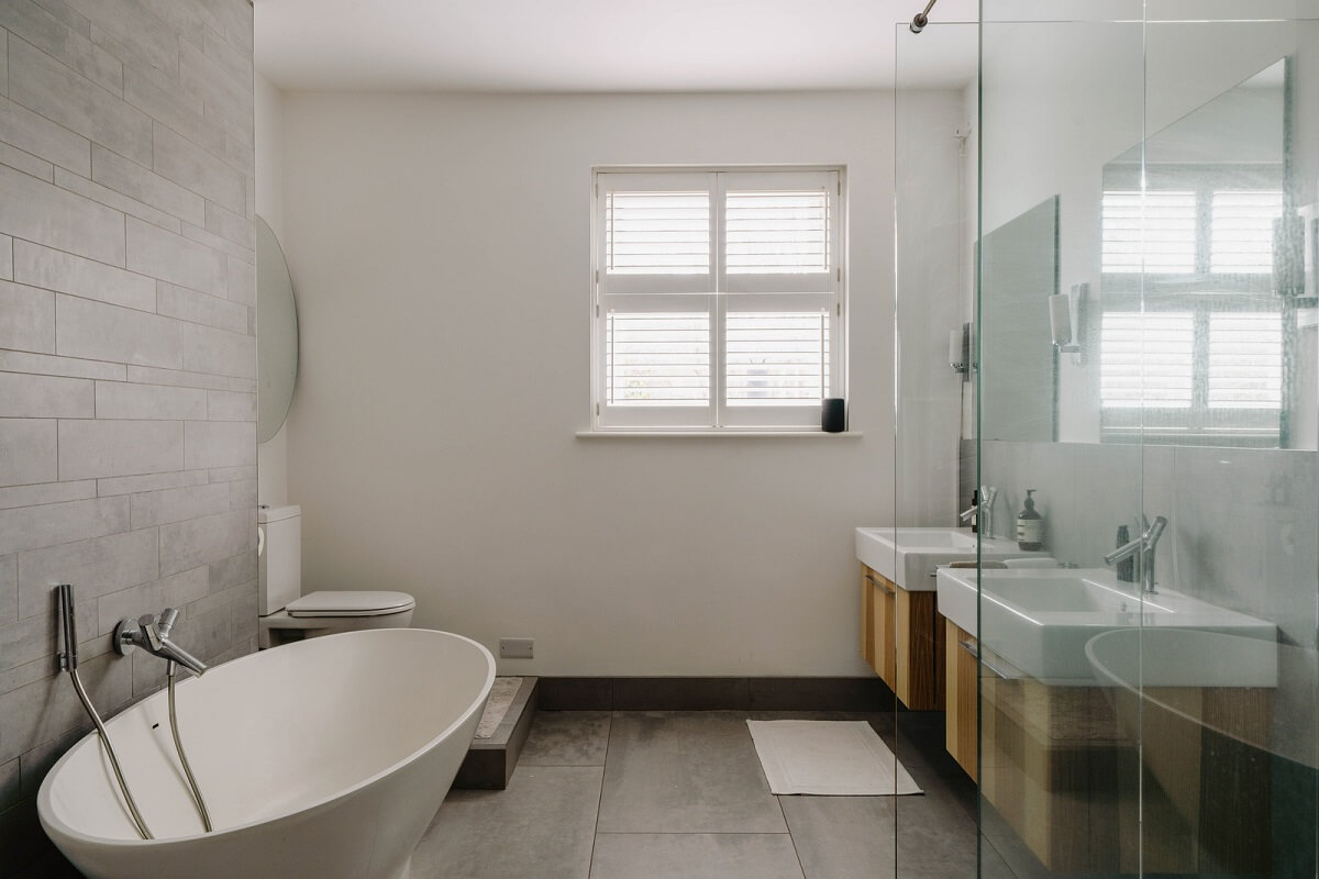 Colorful Walls in an English Victorian Townhouse 16 modern bathroom with gray tiles