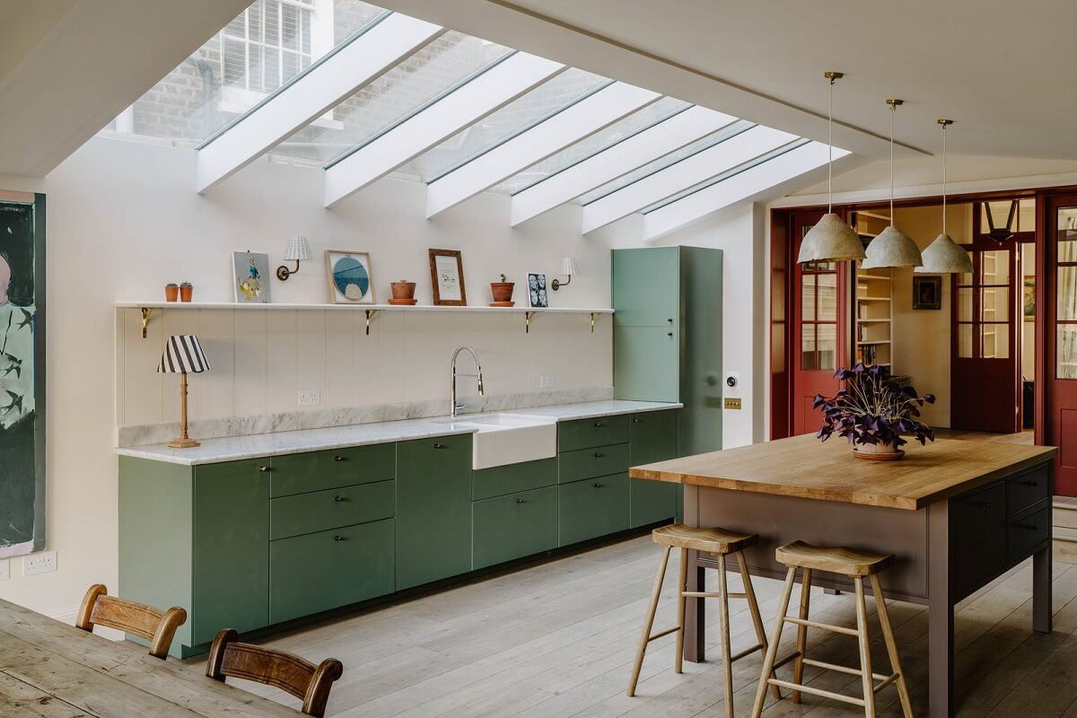 A Restored and Extended London Townhouse 8 modern green kitchen and skylights