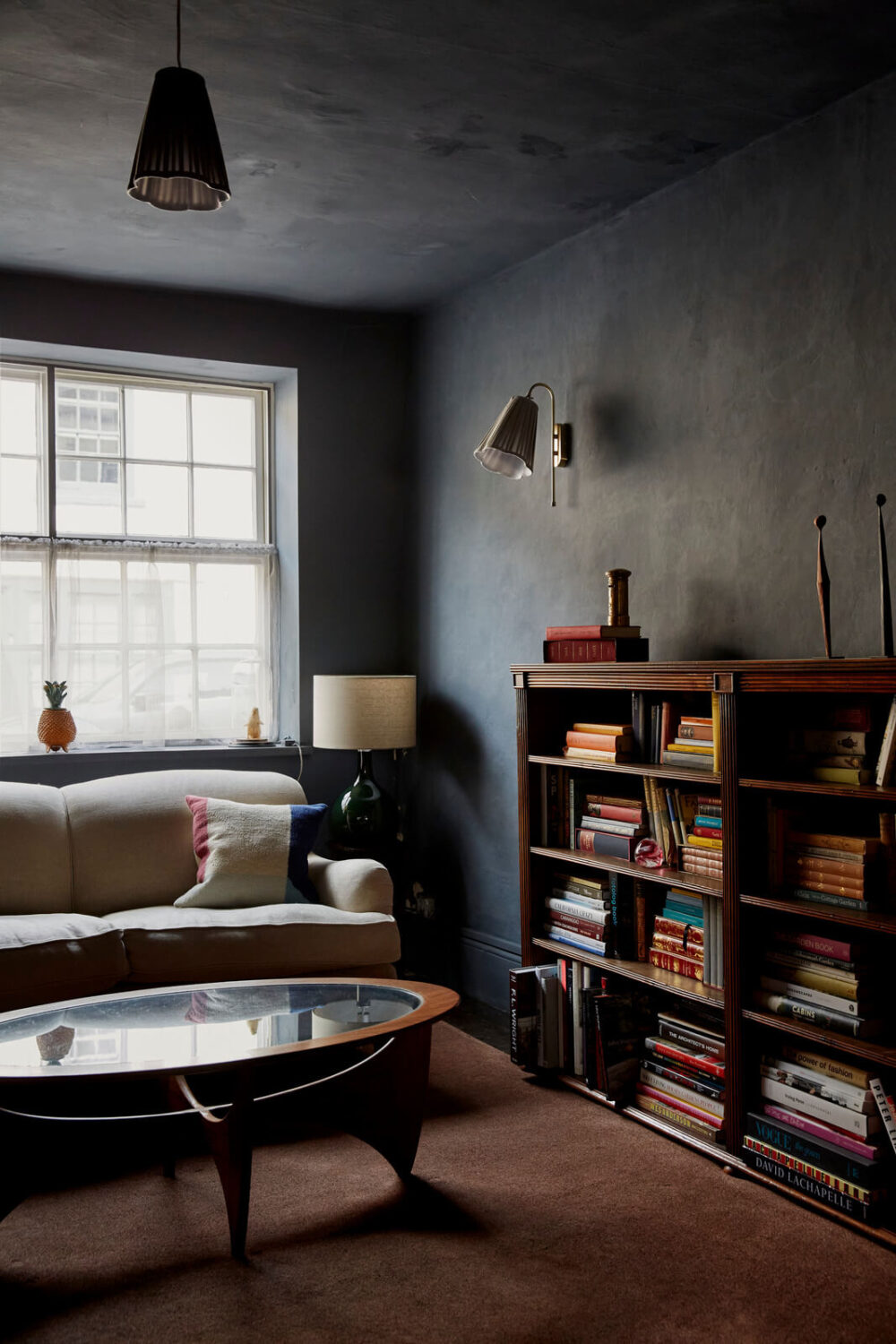 A Cozy Home with Exposed Beams in a Former Post Office 7 moody-blue-living-room