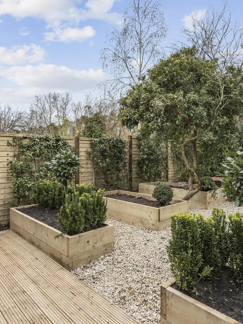 Modern Rustic Interiors in an Edwardian House in London 34 neat city garden with wooden planters