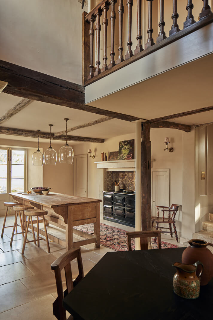 A Historic English Country House with Restored Interiors 2 open plan kitchen exposed wooden beams