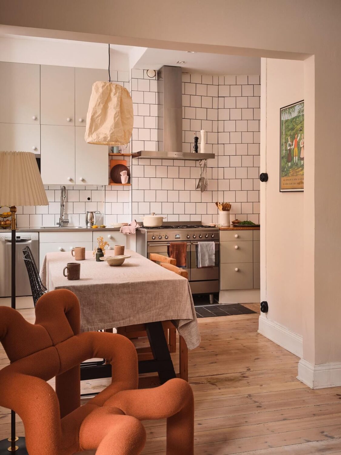 Serene Light Painted Spaces in a Swedish Apartment 9 open-plan-kitchen-living-room-nordroom