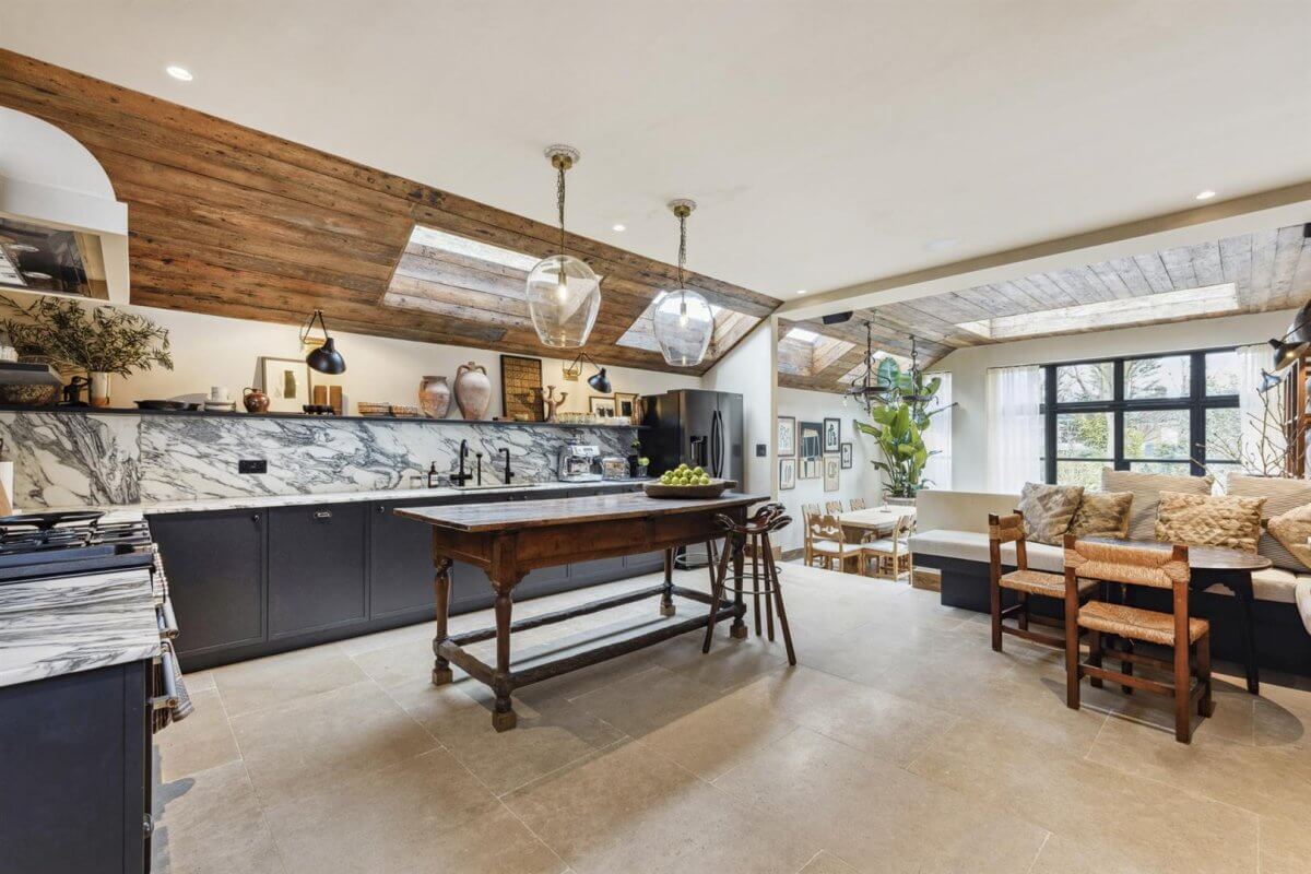 Modern Rustic Interiors in an Edwardian House in London 8 open plan kitchen with rustic wooden slanted ceiling
