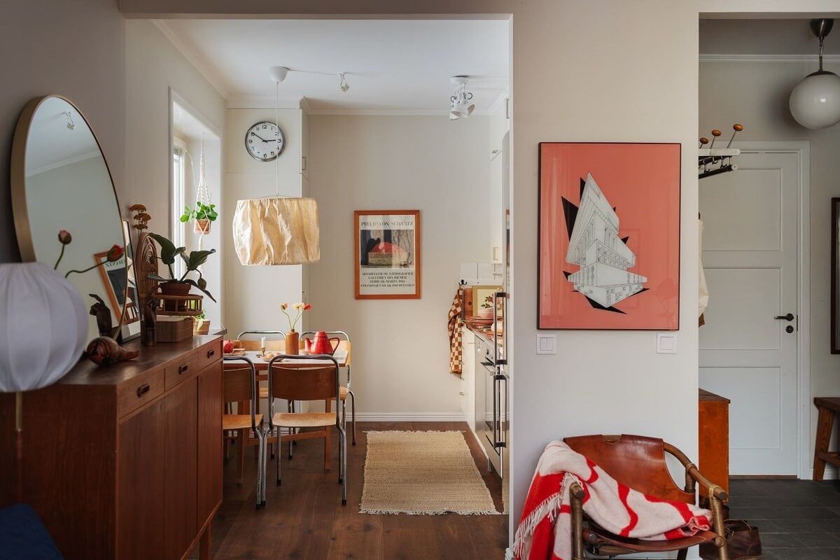 A Small Swedish Apartment with Warm Color Accents 9 open plan living room kitchen