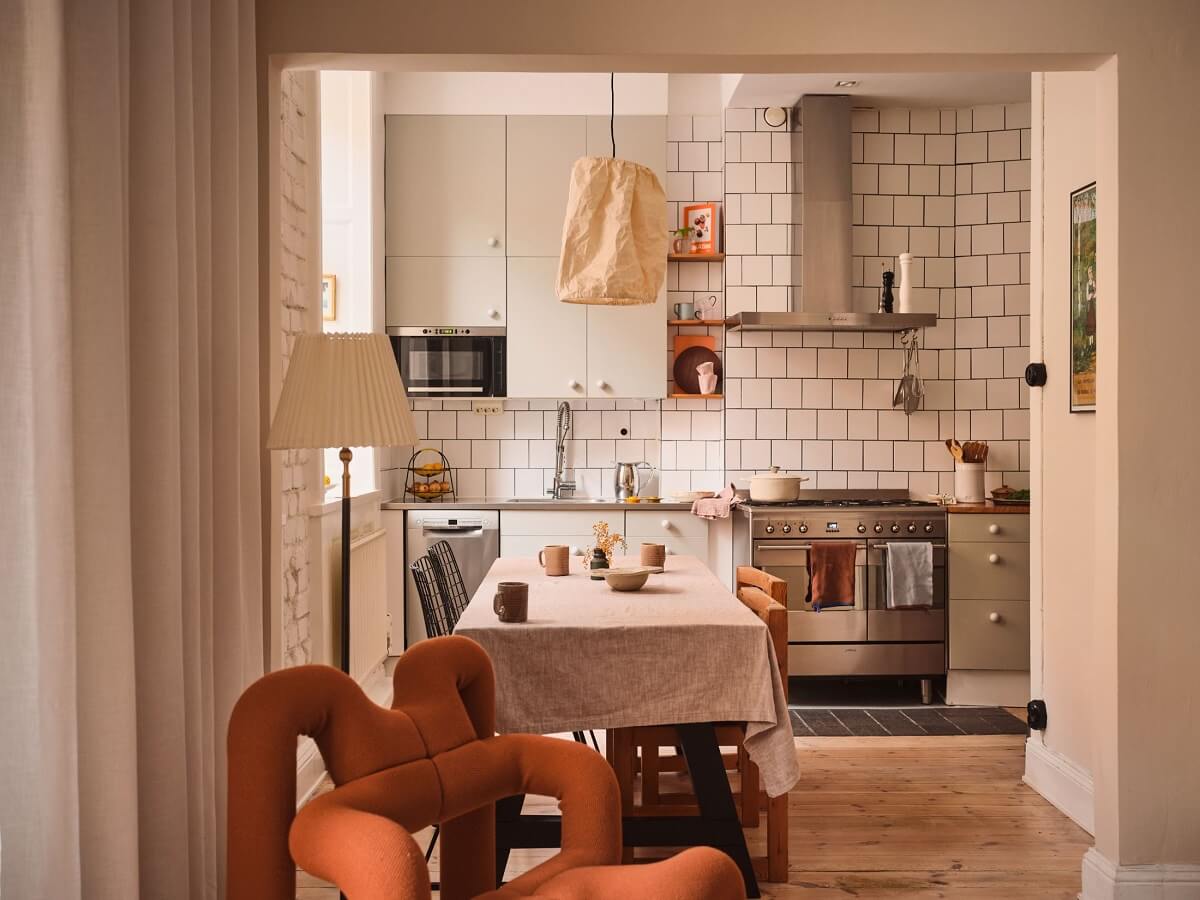 Serene Light Painted Spaces in a Swedish Apartment 8 open-plan-living-room-kitchen