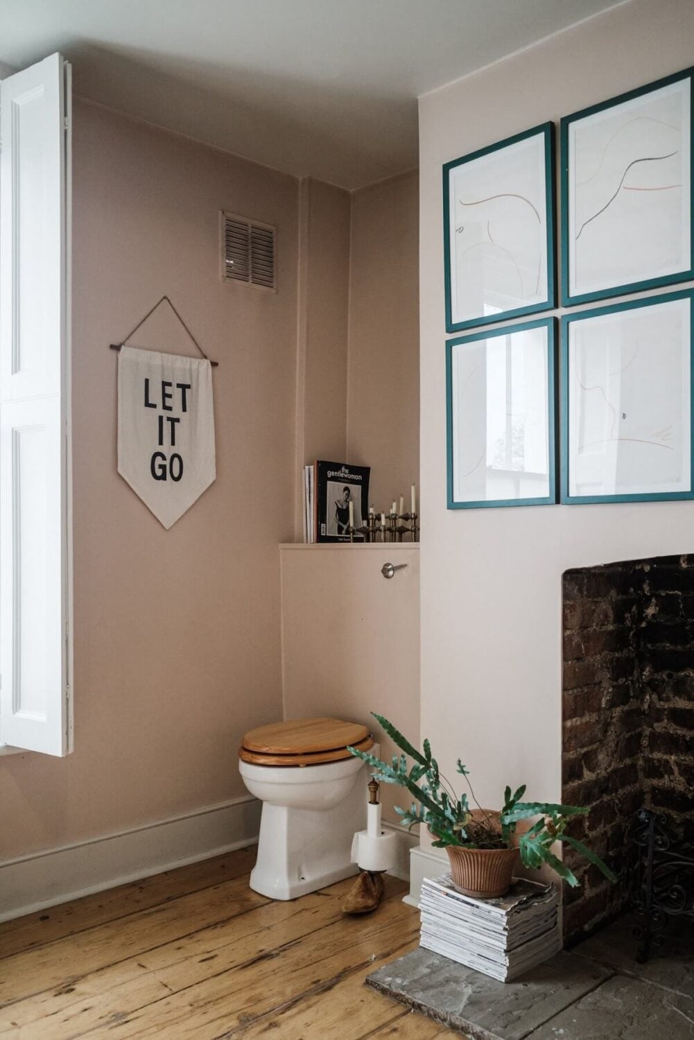 A Cozy and Charming Georgian Townhouse in London 26 pink bathroom with rustic wooden floor