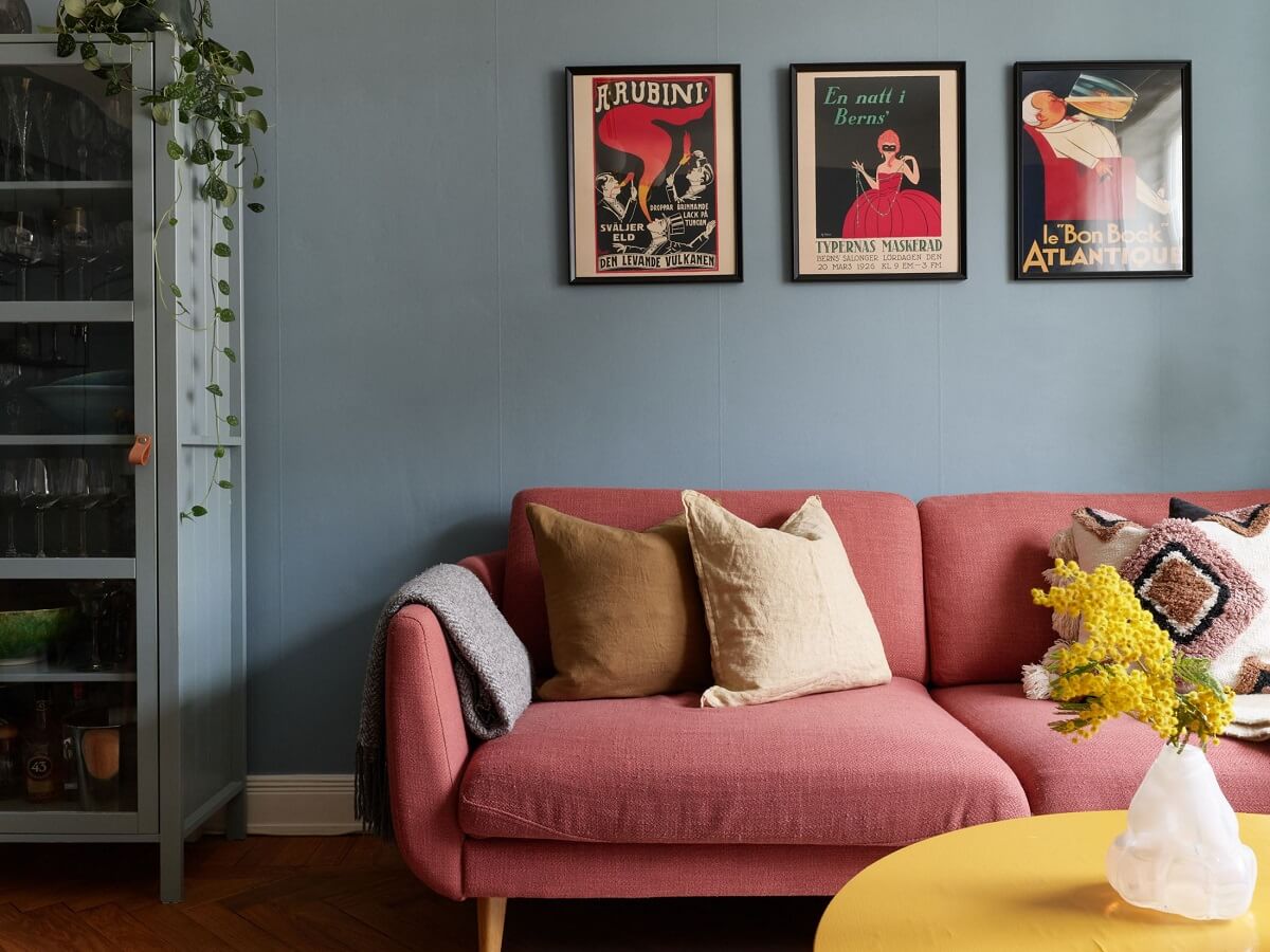 Green Tones in a Renovated Stockholm Duplex Apartment 4 pink sofain scandi living room