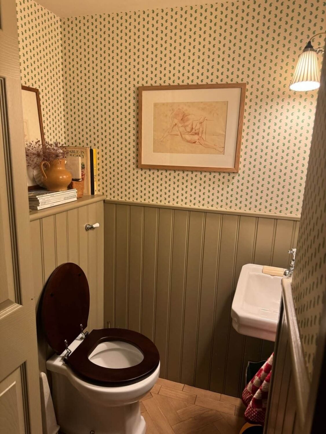 A Cozy and Charming Georgian Townhouse in London 14 powder room with wallpaper and paneled walls