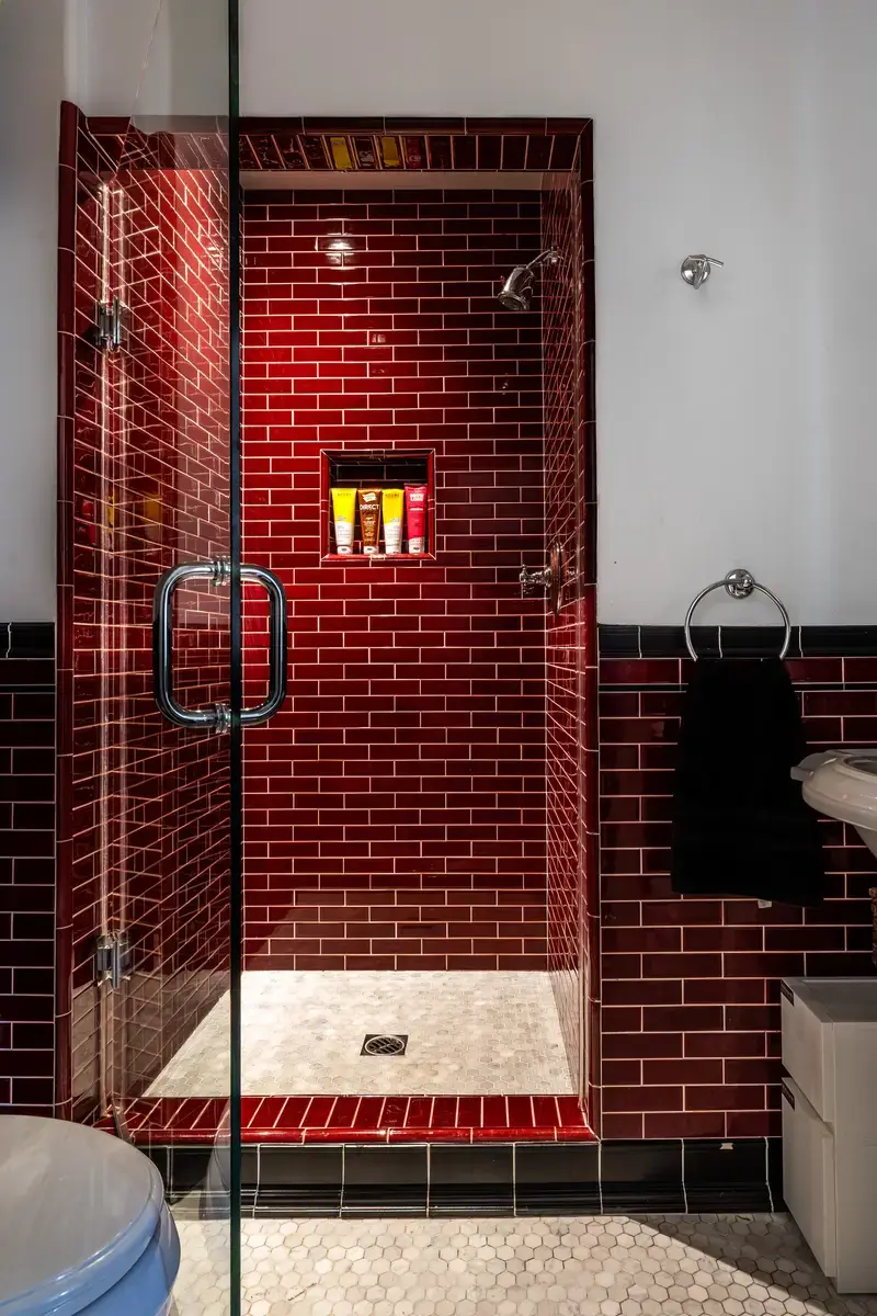 50+ Rooms That Prove ‘The Unexpected Red Theory’ Really Works 60 red shower tiles