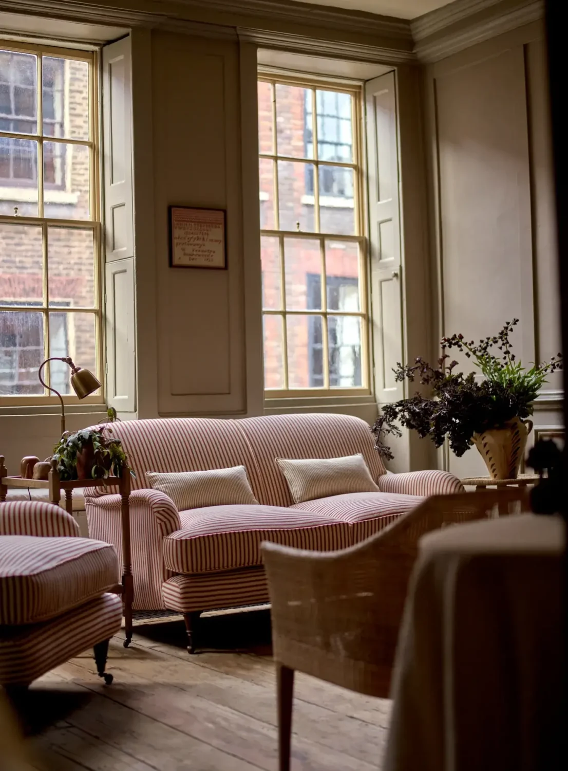 50+ Rooms That Prove ‘The Unexpected Red Theory’ Really Works 16 red striped abington sofa unexpected red theory nordroom