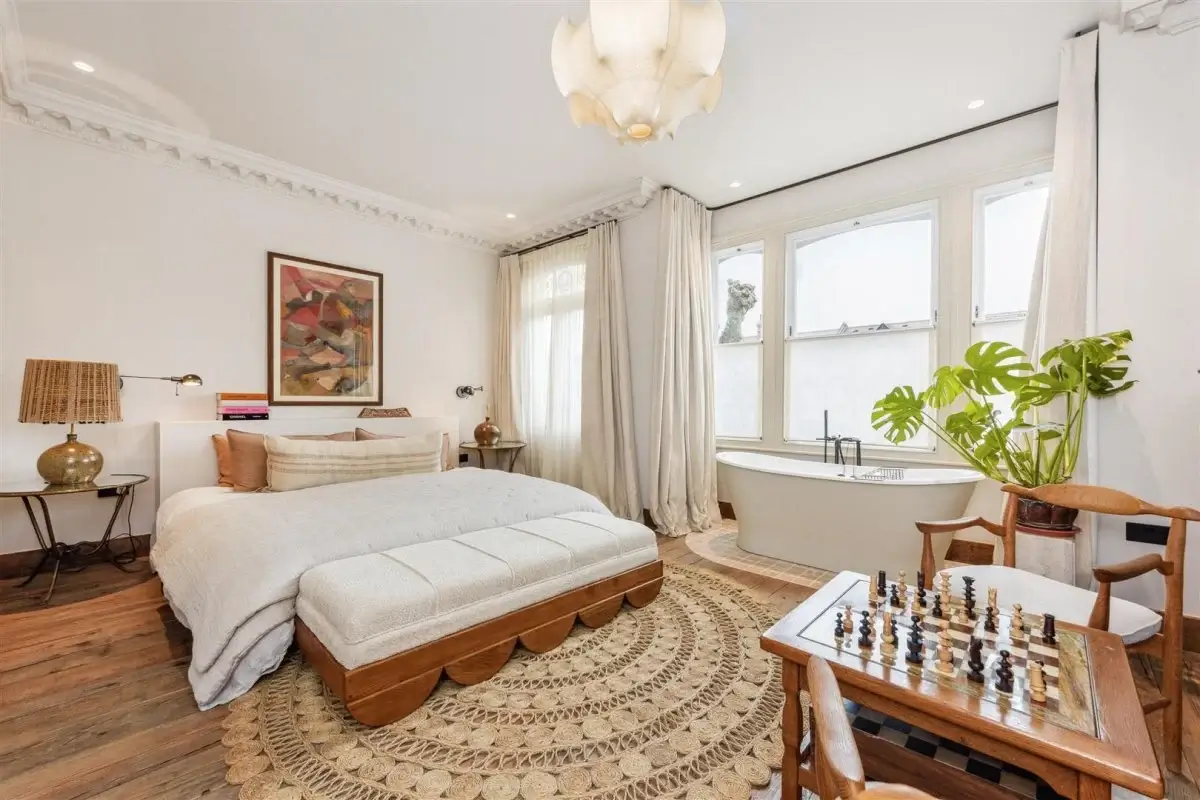 Modern Rustic Interiors in an Edwardian House in London 18 serene bedroom with round rug