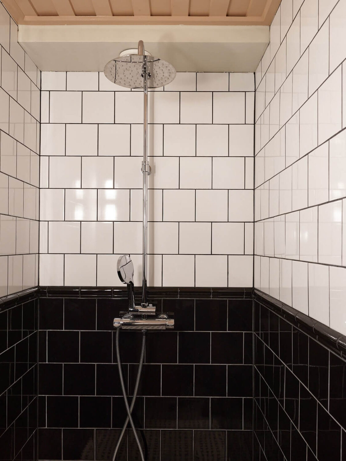 Cozy Vintage Style in a Swedish 1920s Apartment 23 shower black and white tiles