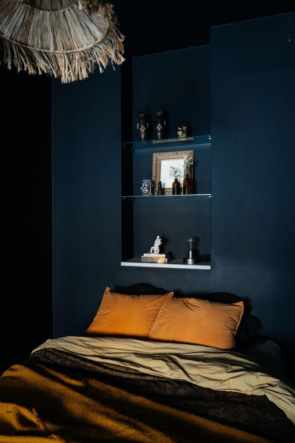 Small Bedroom Decorating Ideas That You'll Love 29 small dark blue bedroom with earthy colored bedding nordroom