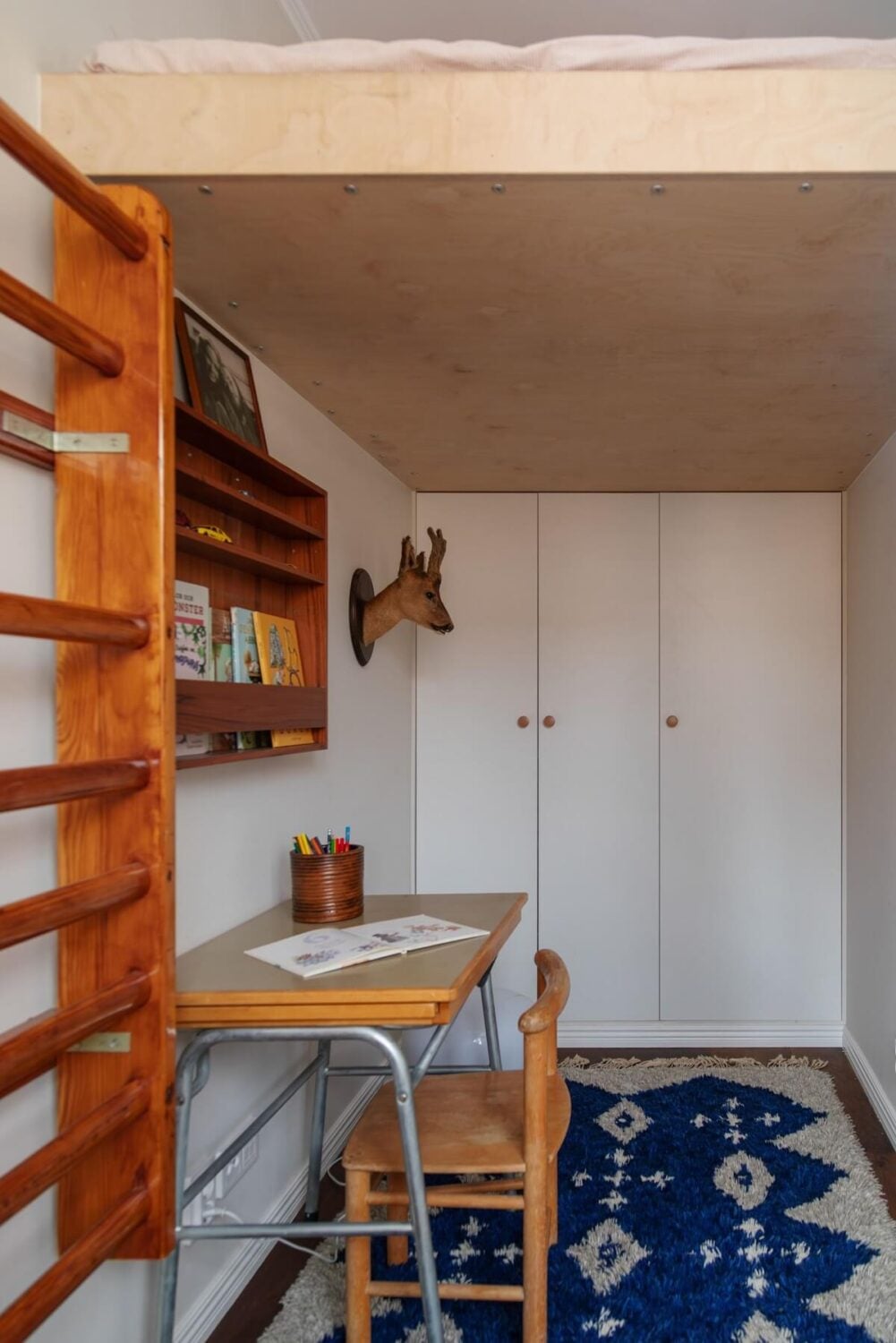 A Small Swedish Apartment with Warm Color Accents 20 small kids bedroom with loft bed and desk