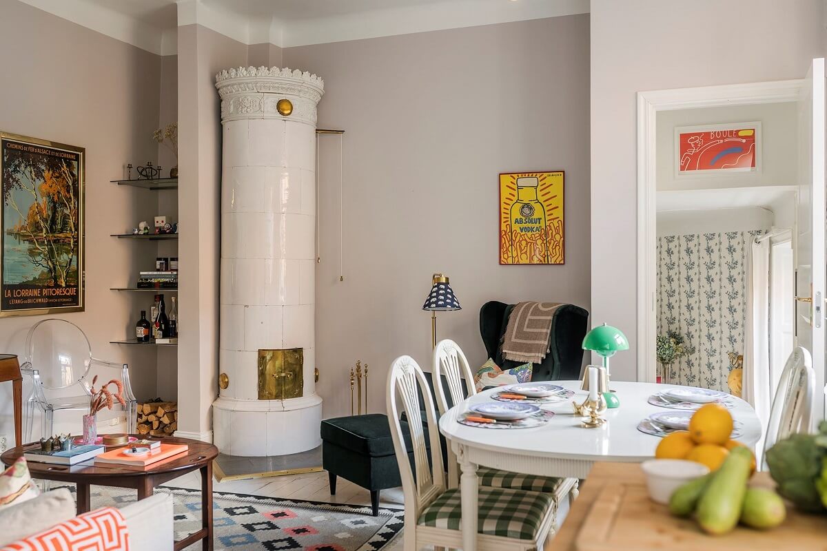 A Small Split-Level Apartment in Stockholm 5 small light gray living room with dining table