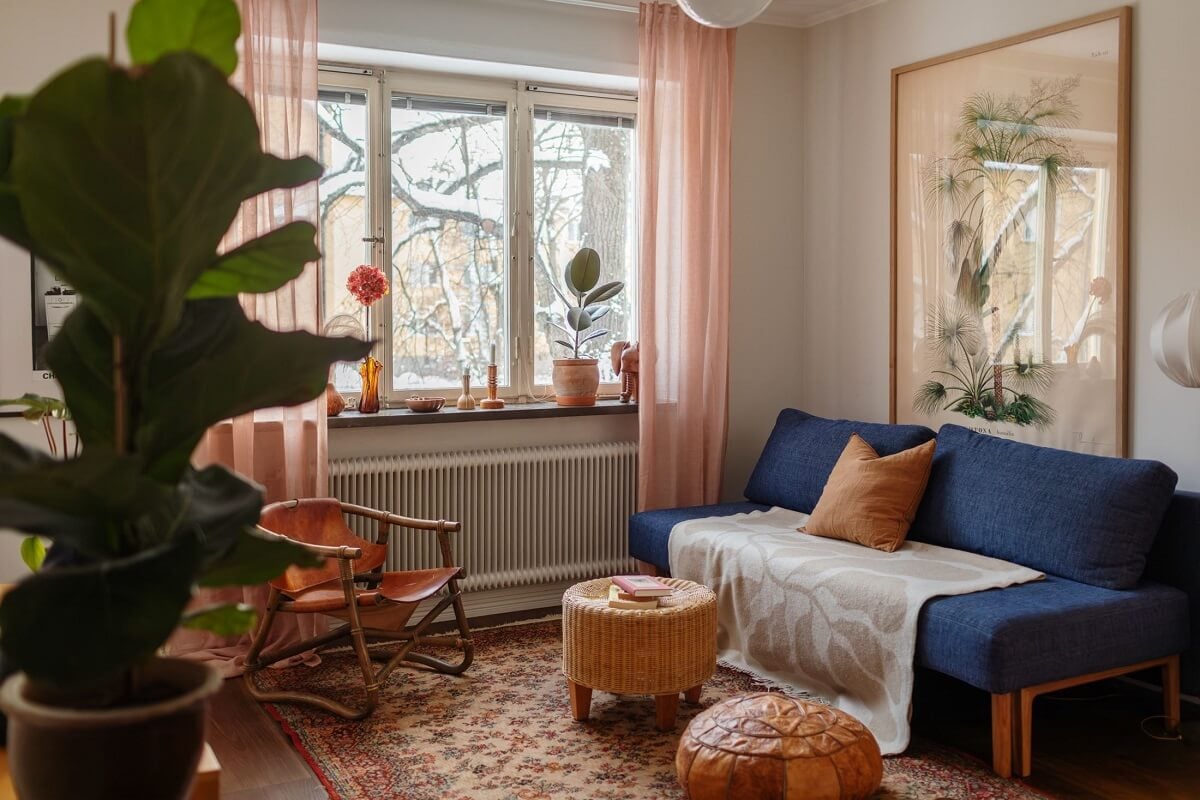 A Small Swedish Apartment with Warm Color Accents 4 small living room with warm color accents