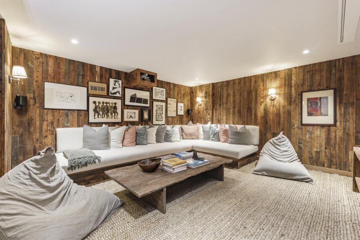 Modern Rustic Interiors in an Edwardian House in London 16 television room with wooden walls